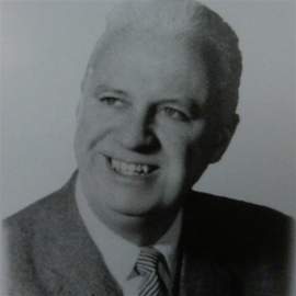 John Redmond: A Sky Blue Shirt And A Rainbow Tie