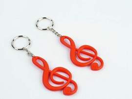 Keyring g-clef red rubber 7,7cm
