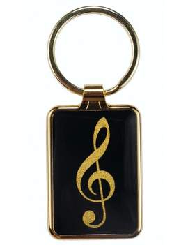 Schlüsselanhänger Violinschlüssel schwarz/gold 7,5 x 3 cm Metall